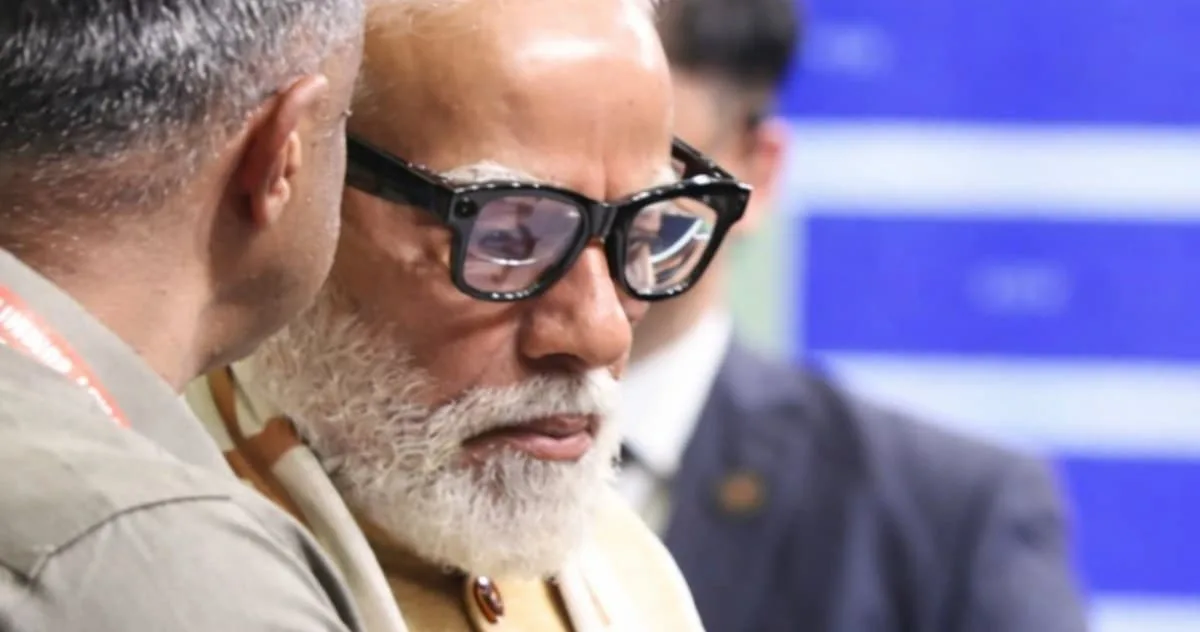 PM Modi trying Sarvam AI Kaze smart glasses at the summit