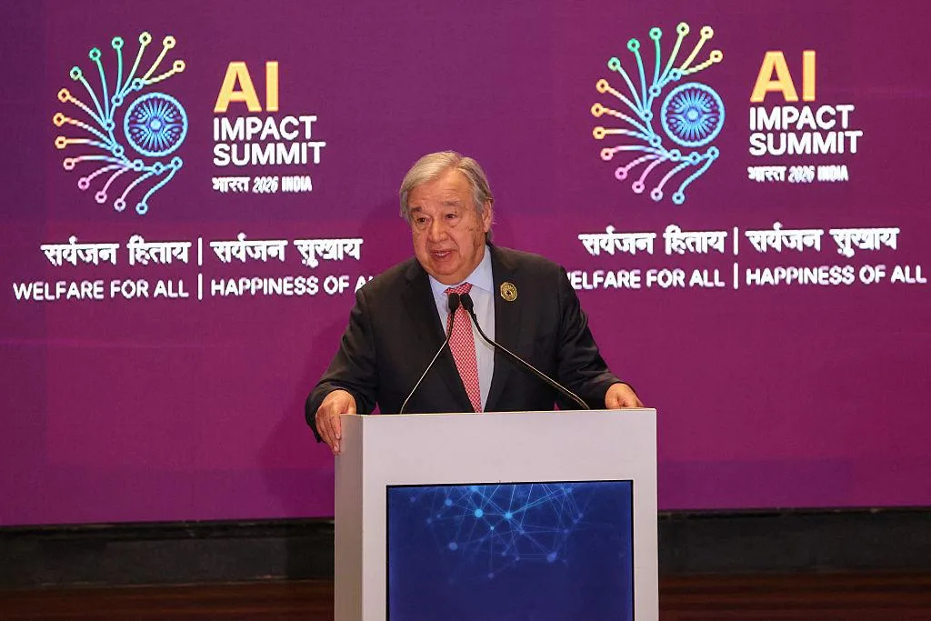 Attendees at the India AI Impact Summit exhibition